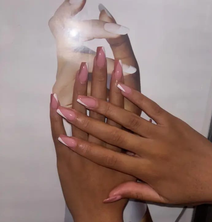 Dusty pink nails with white V tips